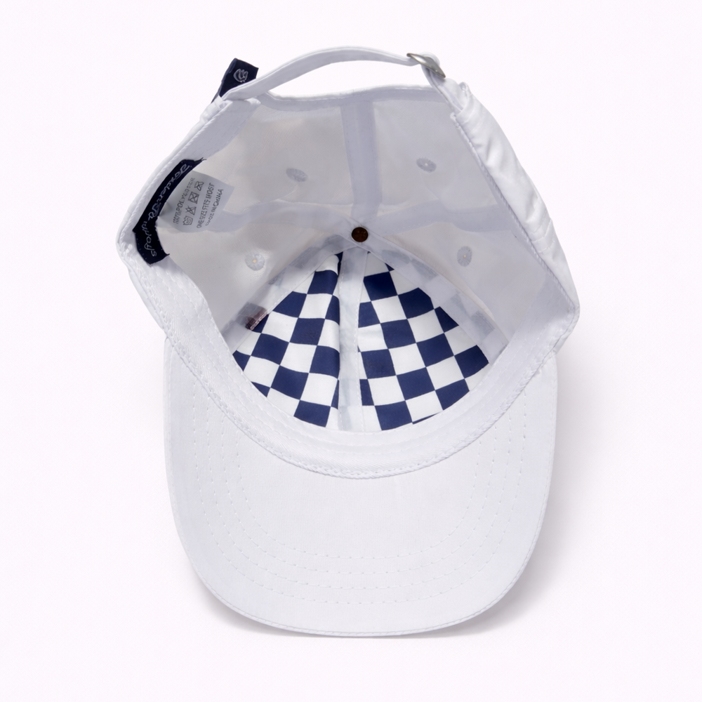 White baseball cap with blue and white checkered interior on a white background